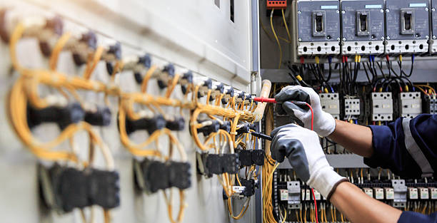 Professional Electrician technician working in Edgewood, MD
